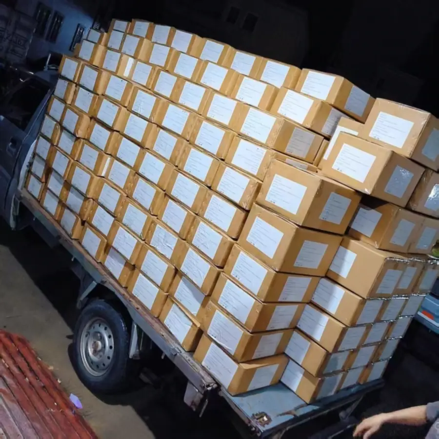Bulk sweater orders loaded for shipment after TYKNIT quality checks