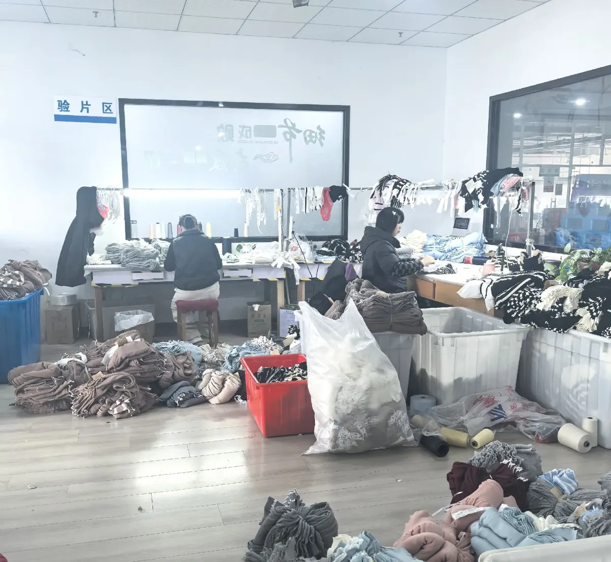 Knitwear quality inspection work area before packing at TYKNIT