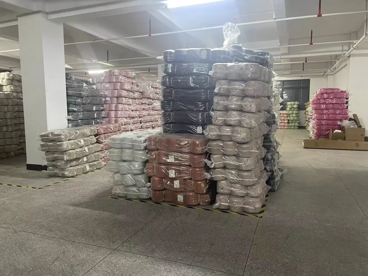 Yarn inventory prepared for custom sweater manufacturing at TYKNIT