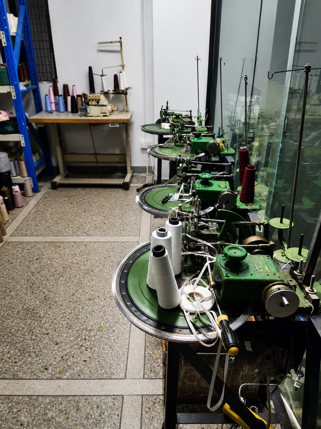 TYKNIT linking and finishing machines used for sweater assembly and knitwear production
